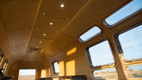 interior view of bus covered in paneling