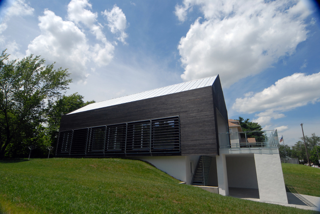 Modern house built into the side of a hill