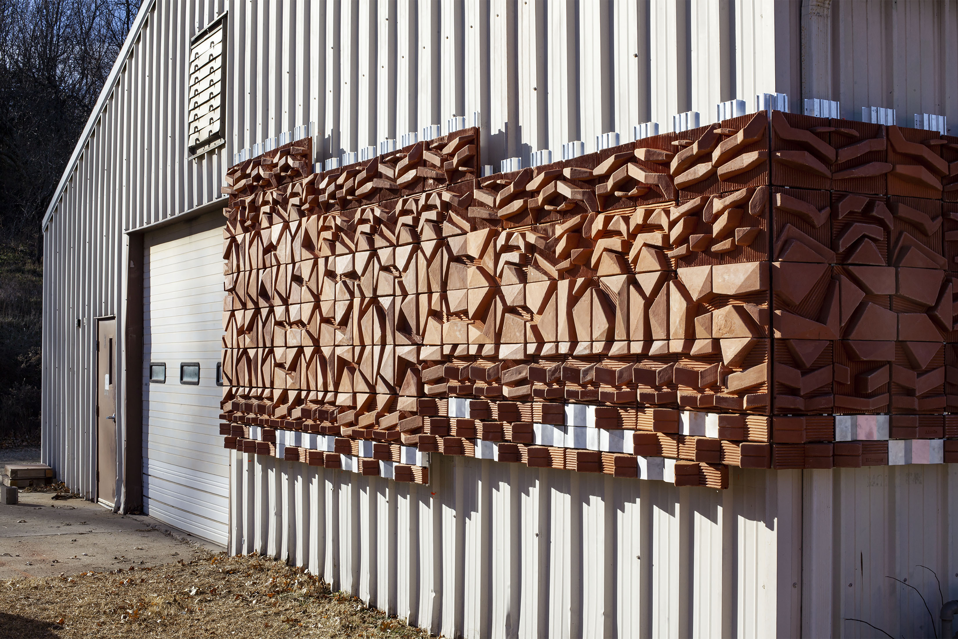 Corner of building featuring terracotta tile installation