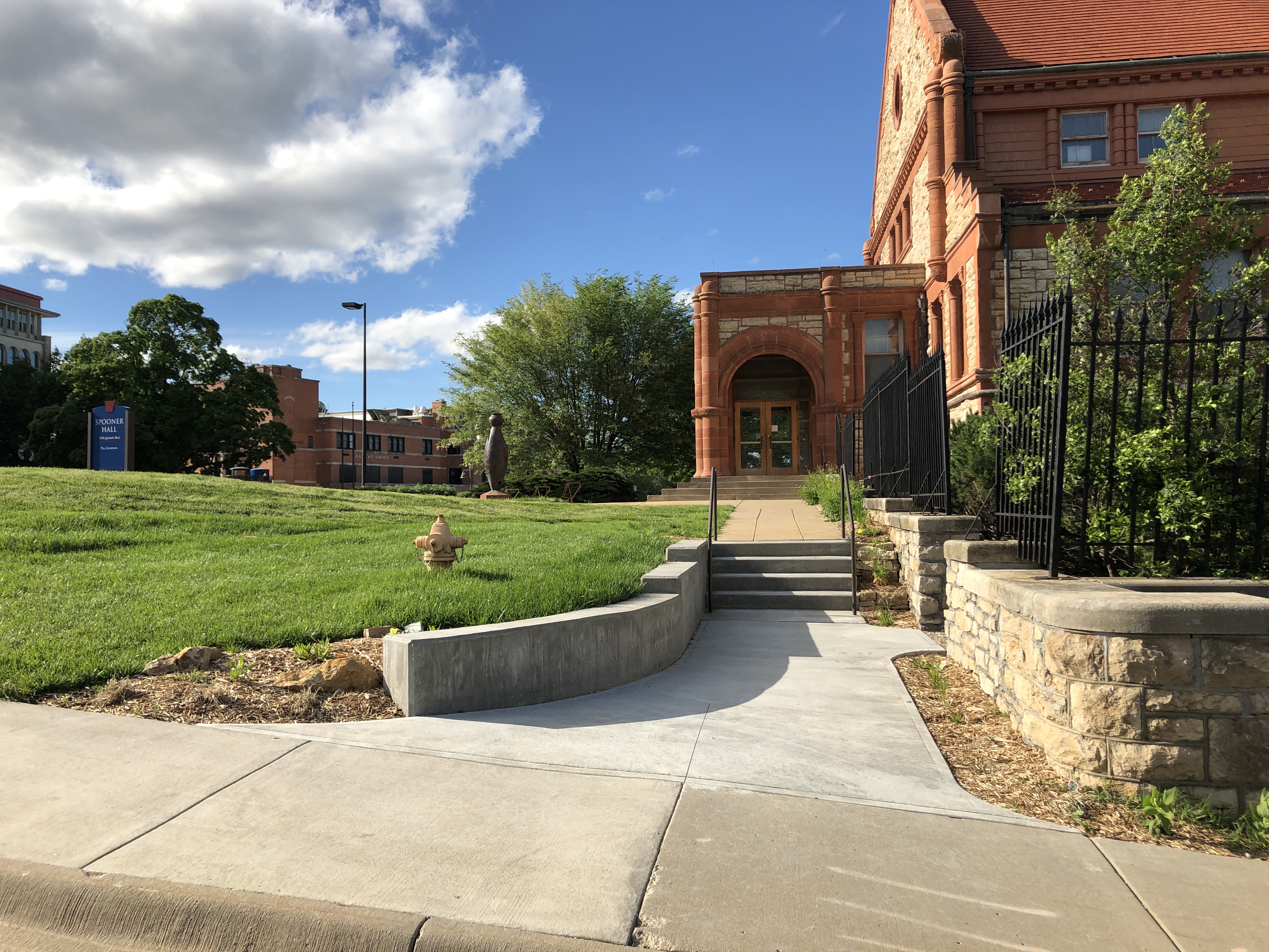 Sidewalk entry to garden and Spooner Hall