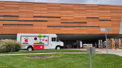 image of bookmobile parked at the Lawrence Public Library